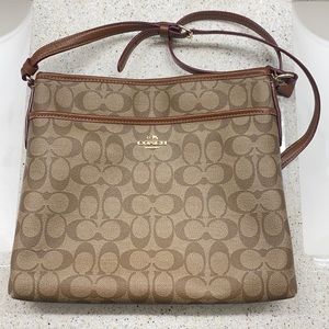 Brown leather coach purse